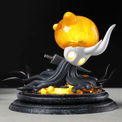 Figura Hollow Knight – Receptáculo roto con Luz